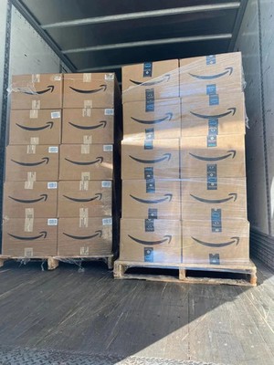 Shipping container being loaded